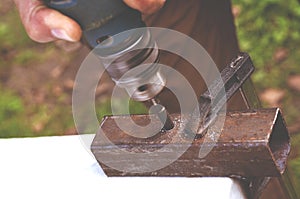 technician working on a lathe and tools to work. Technicians, workers, engineers working with metal lathes