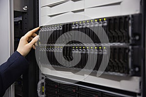 Technician working on server tower