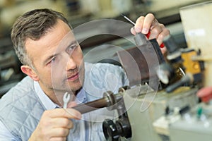 technician wroking in metalworks factory