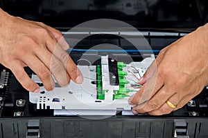 Technicians are installing optic fiber.