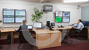 Technicians sitting in office running diagnostics