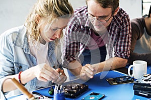 Technicians are working on computer hard disk