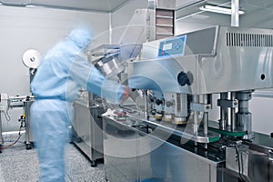 Technicians working in the pharmaceutical production