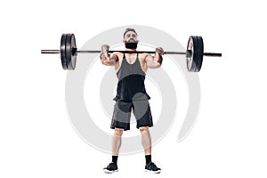 The technique of doing an exercise of deadlift with a barbell of a muscular strong tattooed bearded sports men on a