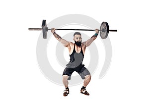 The technique of doing an exercise of deadlift with a barbell of a young strong bearded sports men on a white isolated