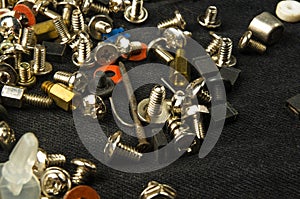 various screws, bolts, washers, nuts and other computer small fasteners