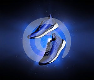 Technological running shoes with a flash of blue light in the dark