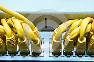 Technology and communication, service cabinets with connected wires, cords.