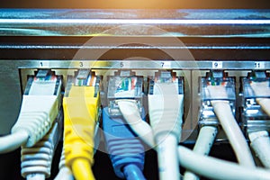 Technology and communication, service cabinets with connected wires, cords.