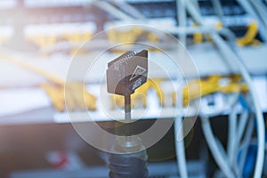 Technology and communication, service cabinets with connected wires, cords.