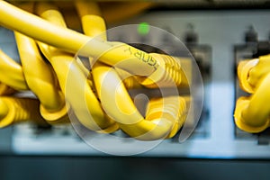 Technology and communication, service cabinets with connected wires, cords.