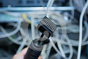 Technology and communication, service cabinets with connected wires, cords.