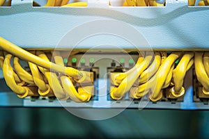 Technology and communication, service cabinets with connected wires, cords.