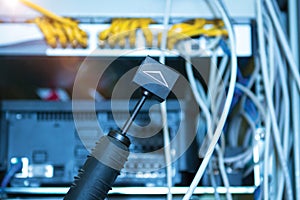 Technology and communication, service cabinets with connected wires, cords.