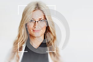 The technology of facial recognition. Portrait of beautiful blonde