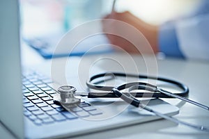 Technology - the greatest tool for medical advancement. Closeup shot of a stethoscope resting on a laptop with an