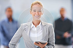 Technology has made our operations more efficient. Portrait of a female factory manager standing with her arms crossed.