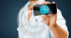 Technology in Health and Medicine Concept. Doctor With Smartphone With Medical App photo