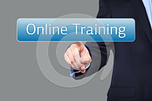 Technology, internet and networking concept - businessman pressing online training button on virtual screens