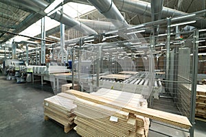 technology of manufacturing of a parquet board. The factory for the production of parquet inside