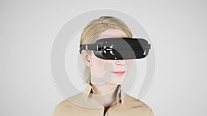 technology, online game, entertainment, virtual world in 3D simulation. millennial woman in vr glasses plays in the