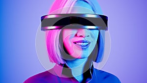 technology, online game, entertainment, virtual world in 3D simulation. millennial woman in vr glasses plays in the neon