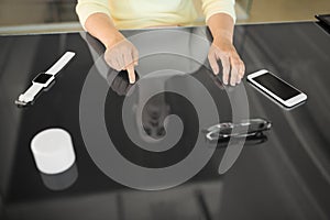 Close up of woman using black interactive panel