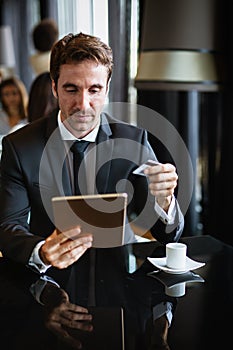 Technology people and online shopping concept. Happy man with tablet pc computer and credit card