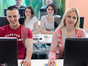 Technology students group in computer lab school classroom