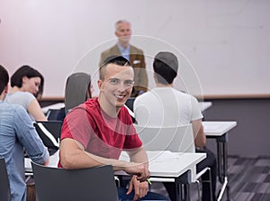 Technology students group in computer lab school classroom