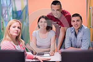 Technology students group in computer lab school classroom