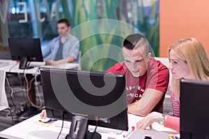 Technology students group in computer lab school classroom