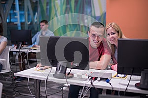 Technology students group in computer lab school classroom