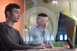 Technology students group working in computer lab school class