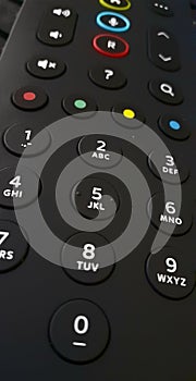 Tecnology -A black  Remote control for television photo