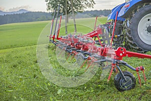 Tedder in an agricultural field