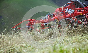 Tedder in an agricultural field