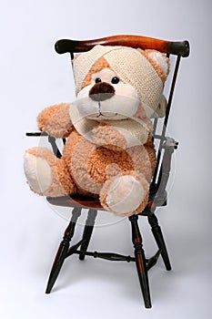 Teddy bear in bandages photo