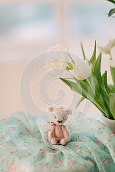 Teddy bear and a bouquet