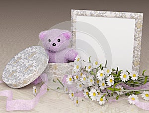 Teddy bear gift with a photo frame and flowers