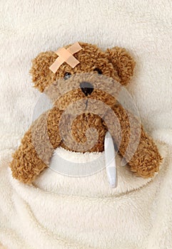 Teddy bear ill photo