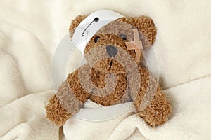 Teddy bear ill photo