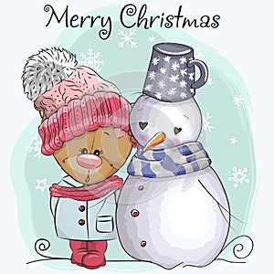 Teddy Bear in a knitted cap and snowman