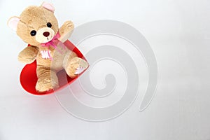 teddy bear and pink hearts on white background, valentine`s day, advertising baner