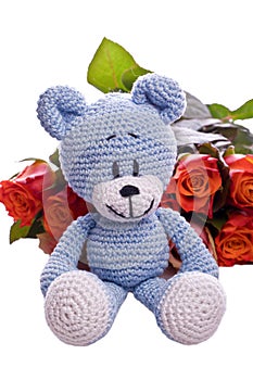 Teddy bear with pink roses