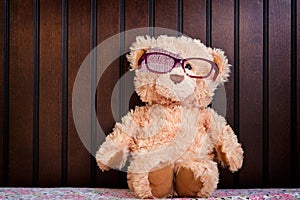 Teddy bear shows how to wear a patch to correct amblyopia