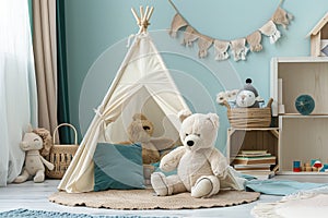 a teddy bear is sitting in front of a teepee in a child s room