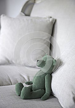 Teddy bear on the sofa