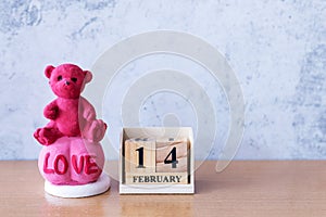 Teddy bear with wooden calendar 14 february. Valentine s day