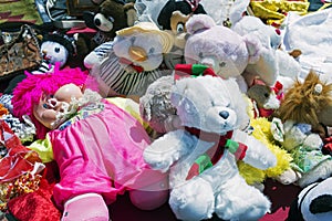 Teddy bears, barbie dolls, toys for kids in a flea market